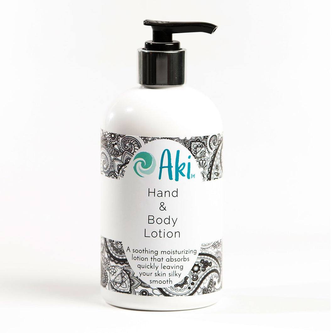 Bottle of Aki hand and body lotion in front of a white background
