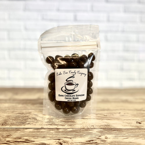 Bag of dark chocolate covered espresso beans from Lake Erie Candy Company on wooden background