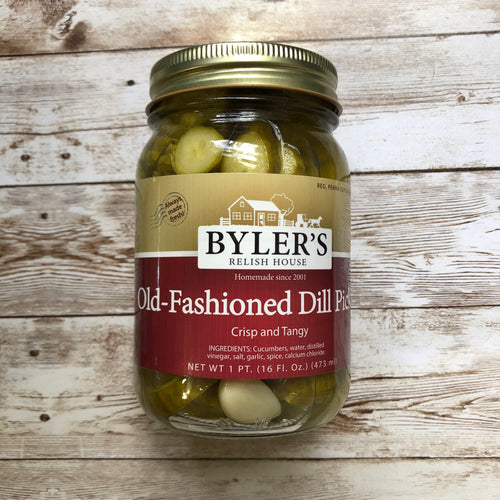 Can of Byler's old-fashion dill pickles on a wooden background